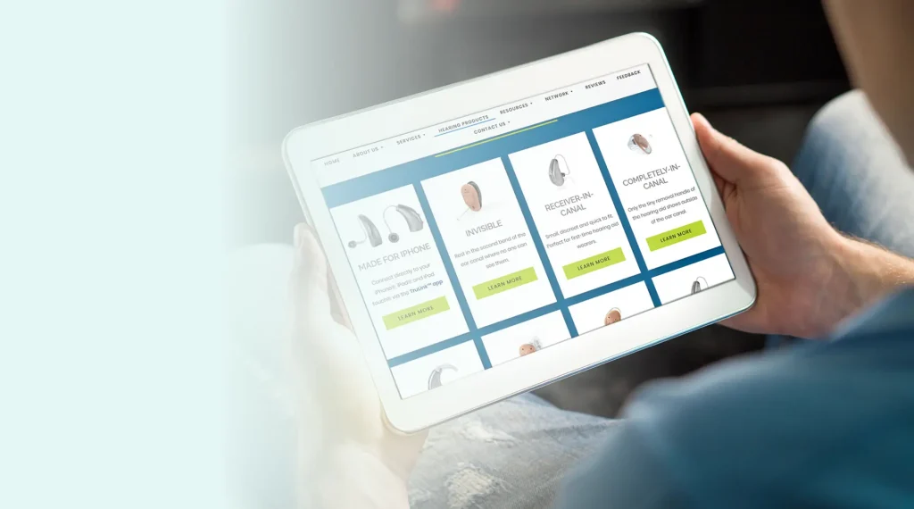 A person using an iPad to browse a shopping app,