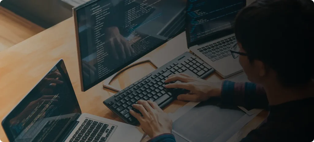 A person focused on a computer,